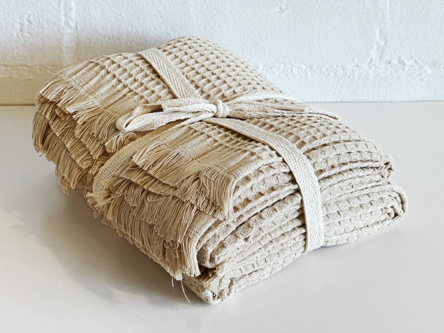 BEIGE WAFFLE FRINGE TOWELS
