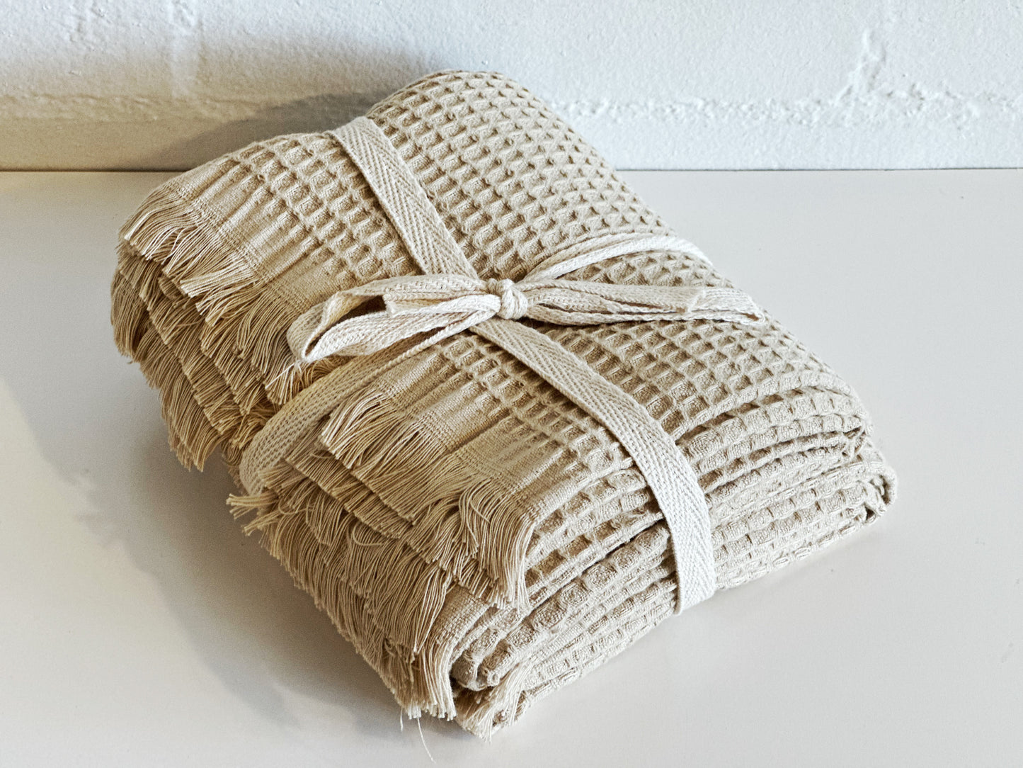 BEIGE WAFFLE FRINGE TOWELS