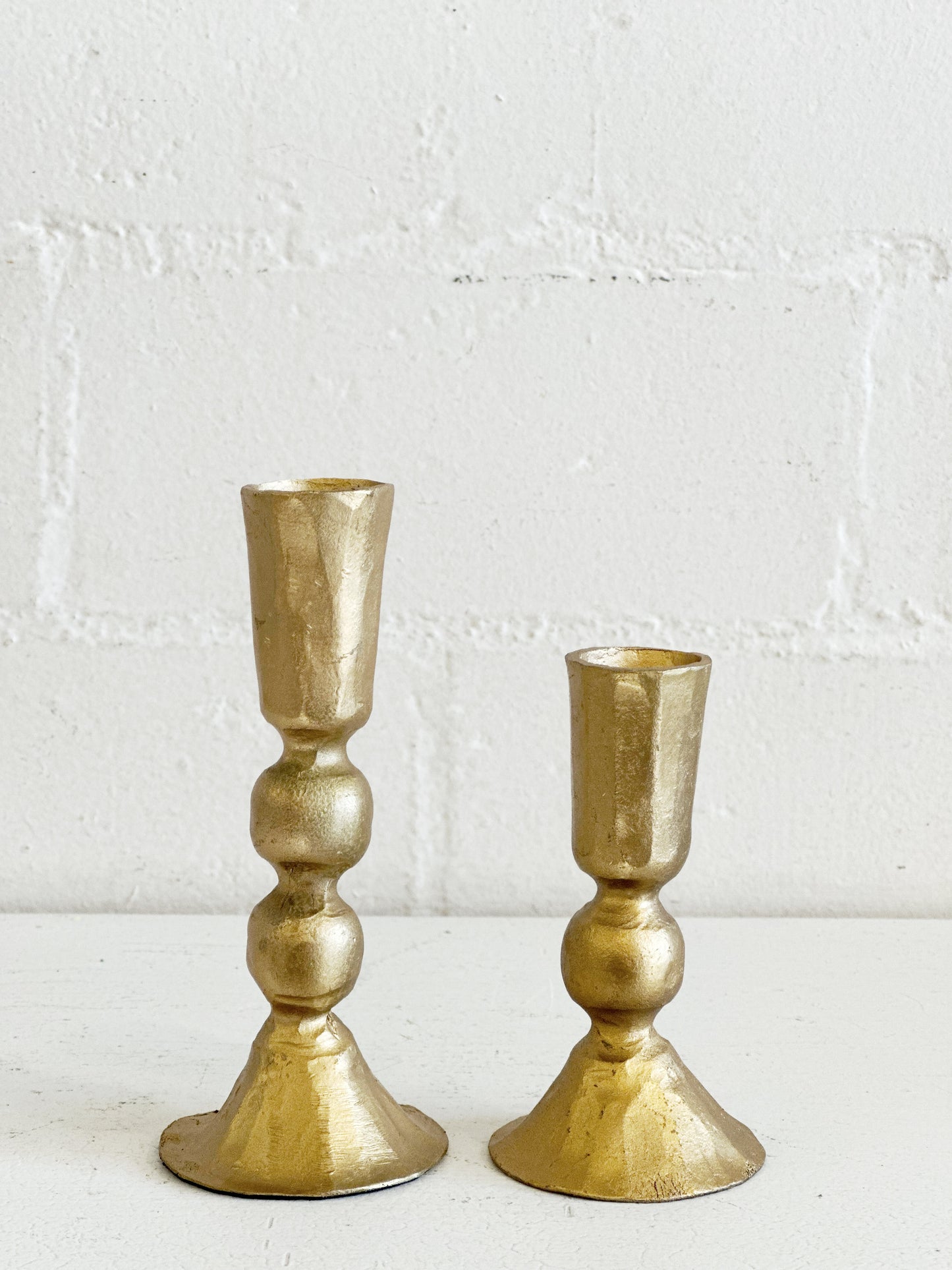 GOLD IRON TAPER CANDLE HOLDERS