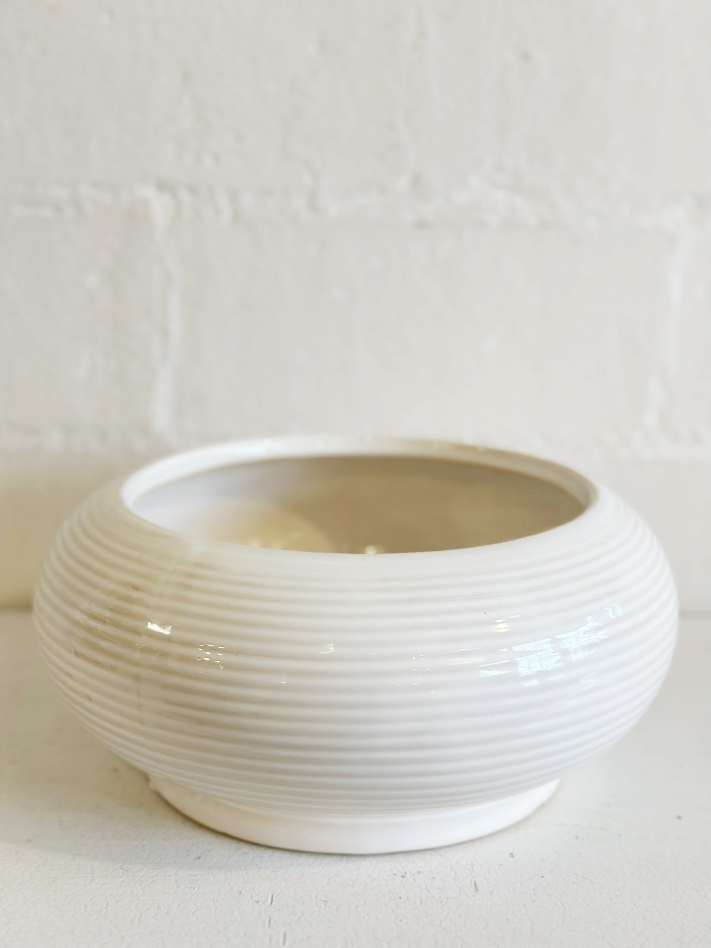 Raised white ceramic bowl