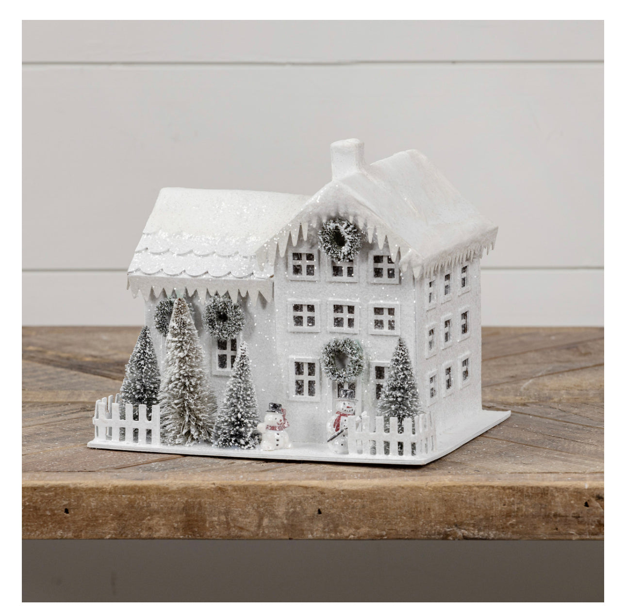 LIGHTED WHITE FARMHOUSE