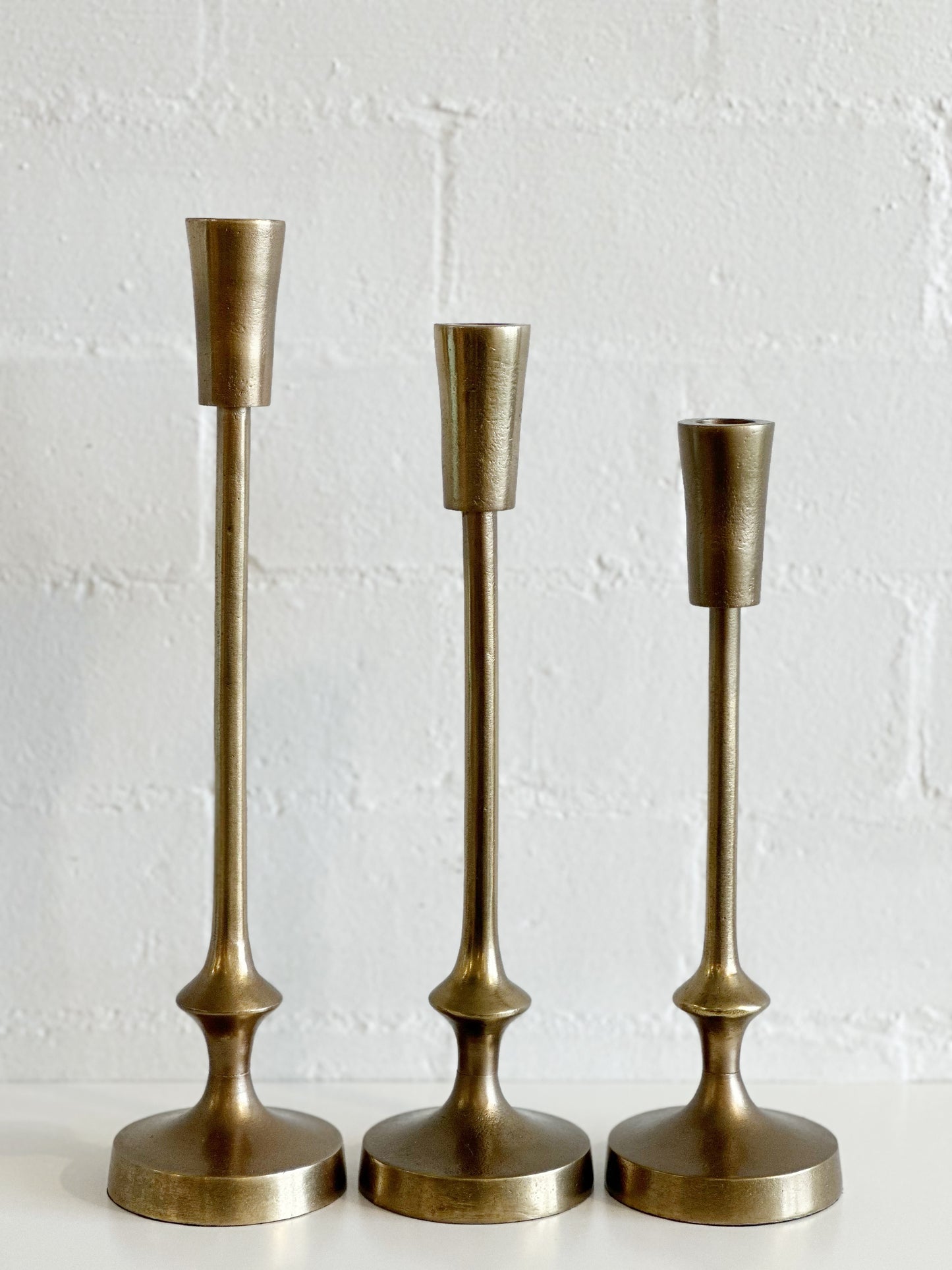 GOLD CANDLE HOLDERS