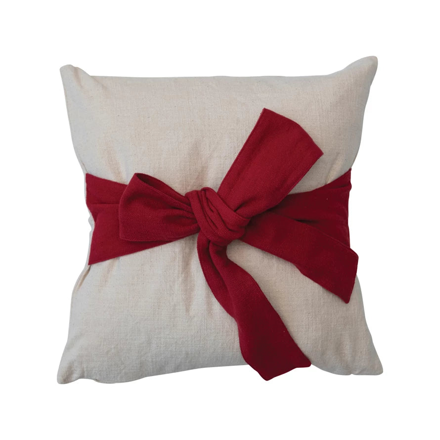 Cream pillow w/Red bow