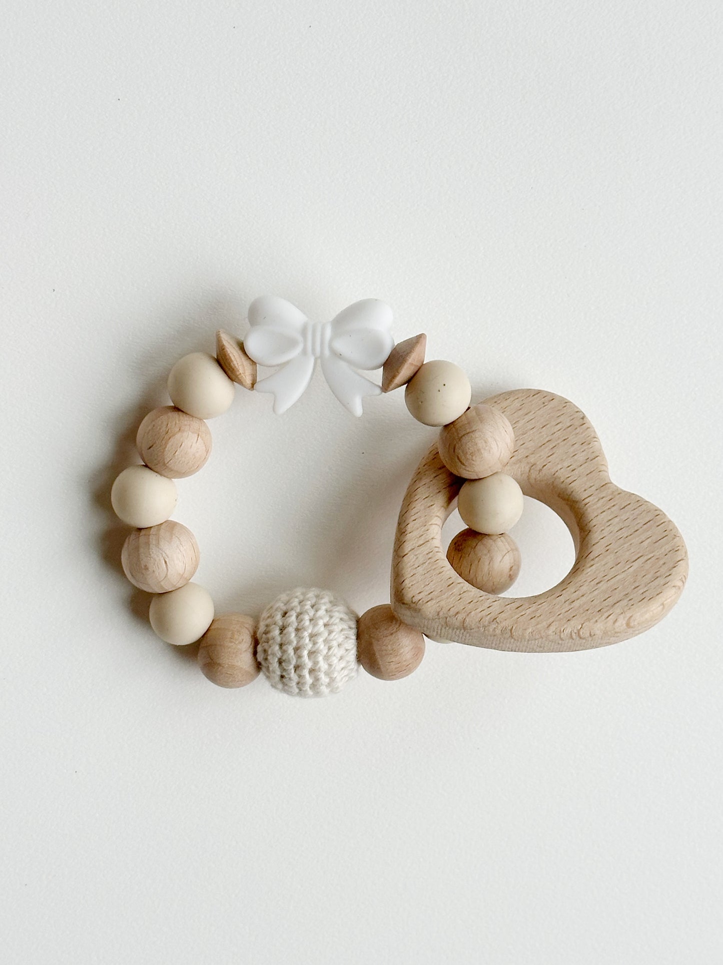 Wooden Heart and Silicone Bow Teething Rattle: Khaki