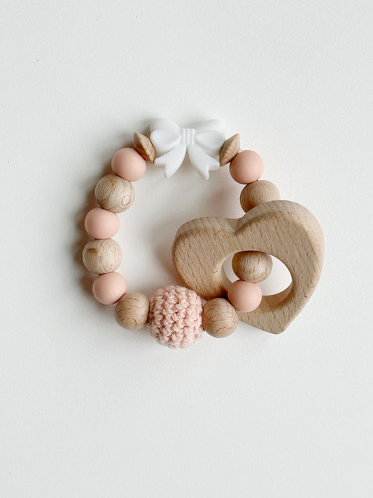 Wooden Heart and Silicone Bow Teething Rattle: Pink