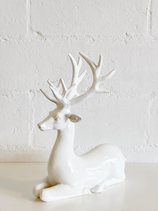 White Sitting Deer