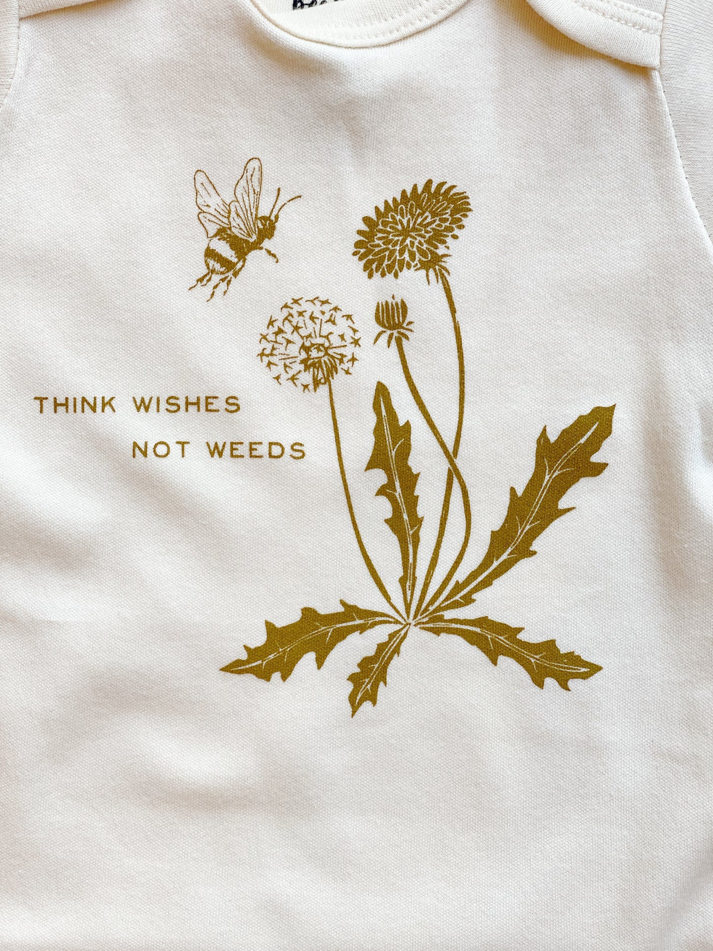 Wishes, Not Weeds Onesie