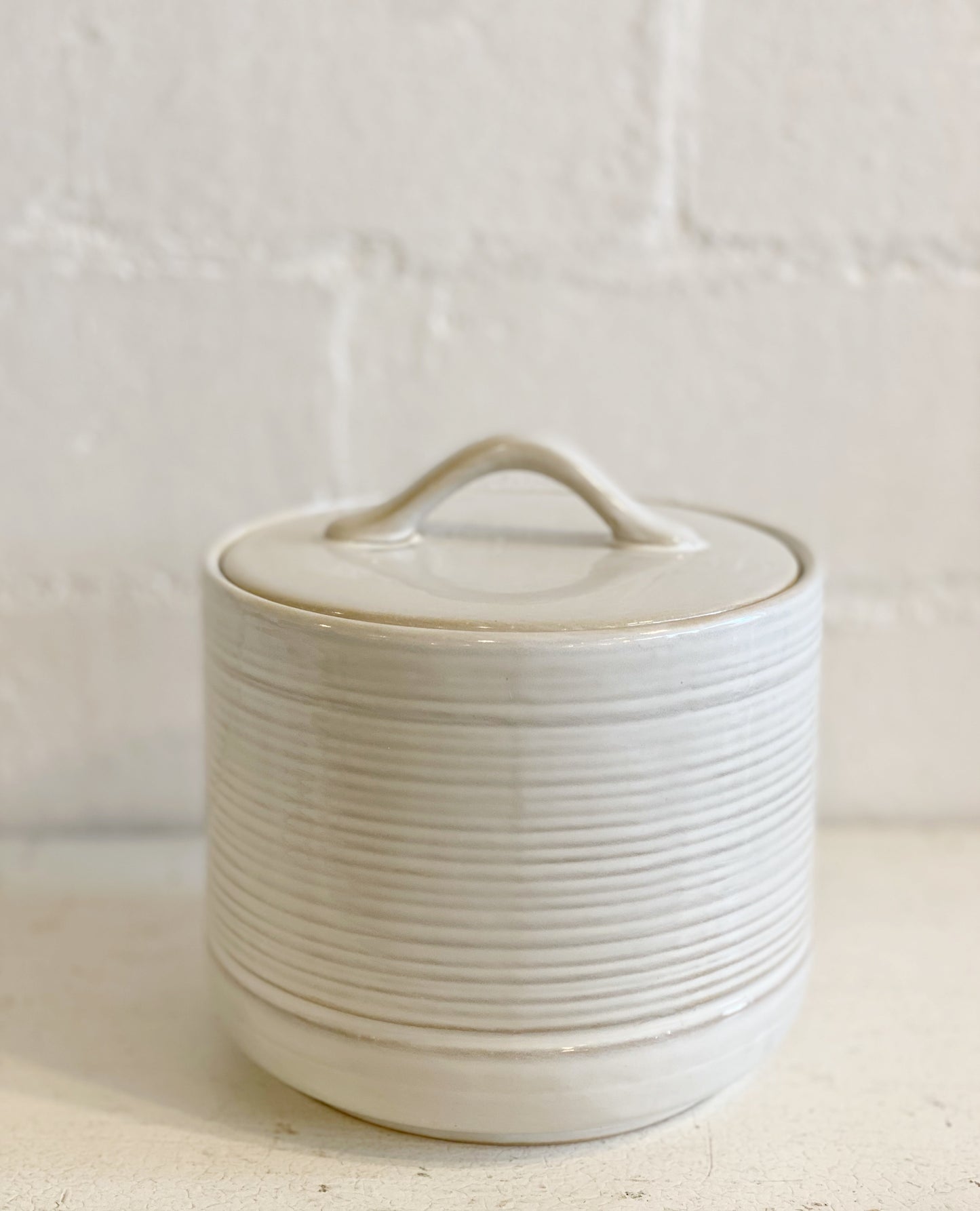 White canister with lid