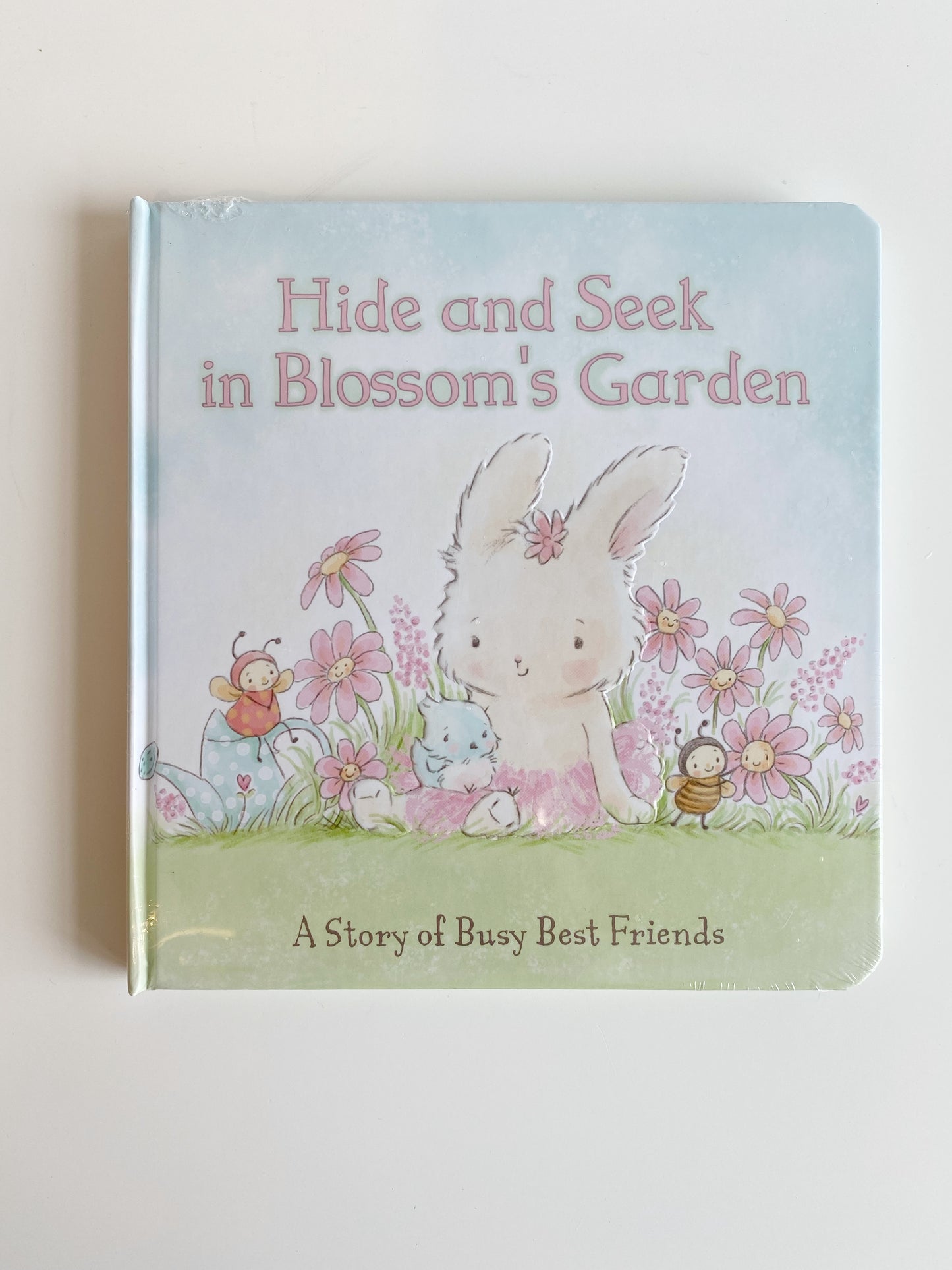 Hide and Seek in Blossom’s Garden. A Story of busy best friends.