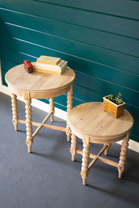 Round wooden side tables with turned legs